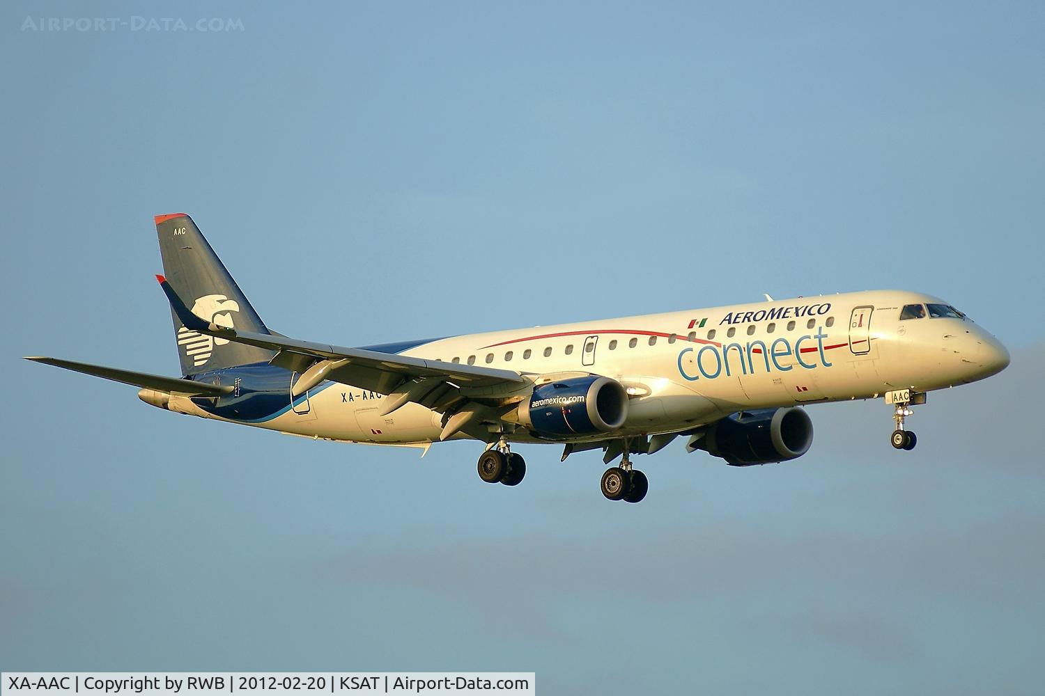 XA-AAC, 2007 Embraer 190LR (ERJ-190-100LR) C/N 19000121, On approach 12R at sunset