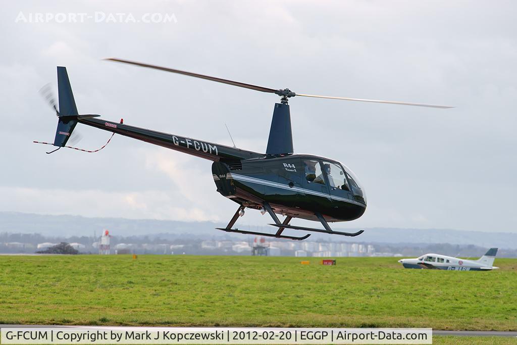 G-FCUM, 2007 Robinson R44 Raven II C/N 11723, Post flight en-route back to General Aviation via taxiway A1.