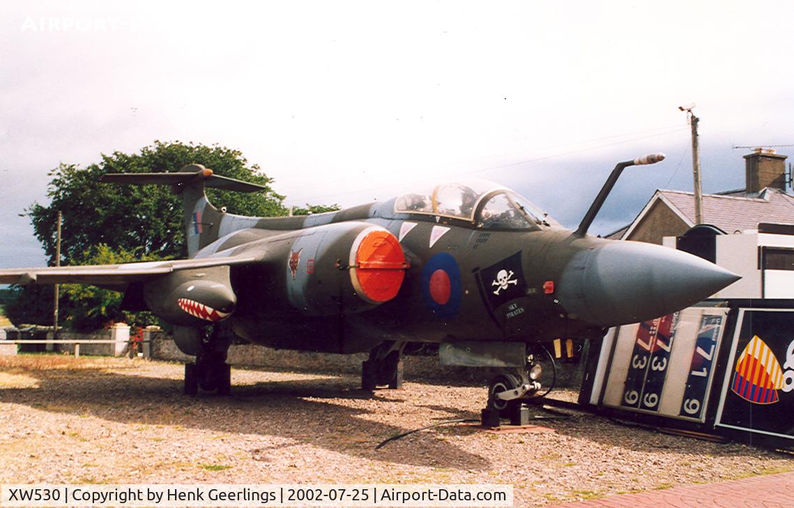 XW530, 1970 Hawker Siddeley Buccaneer S.2B C/N B3-06-69, Lossiemouth, plane laying near garage shop.