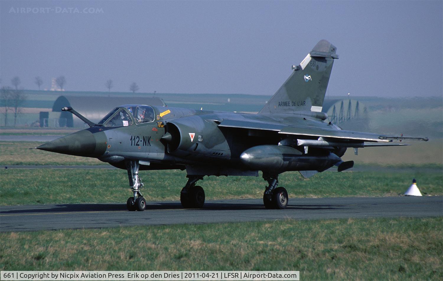 661, Dassault Mirage F.1CR C/N 661, Mirage F-1CR 661 on the taxitrack of Reims-Champagne AB with the, no longer in use, QRA shelters on the background.