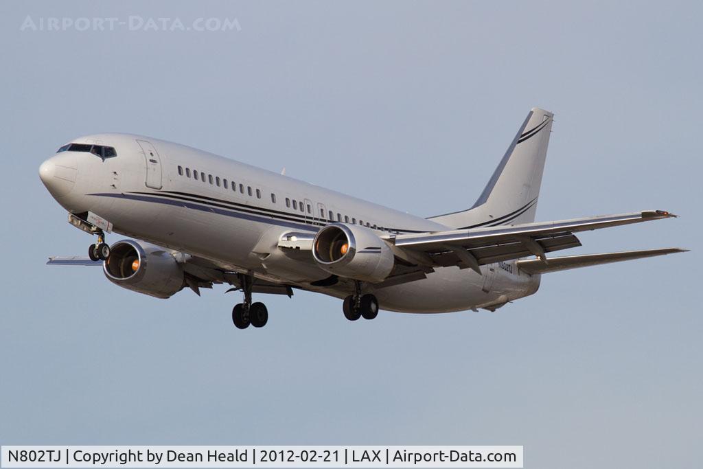 N802TJ, 1990 Boeing 737-4B7 C/N 24874, Swift Air N802TJ (FLT SWQ802) from Denver Int'l (KDEN) on short final to RWY 25L.