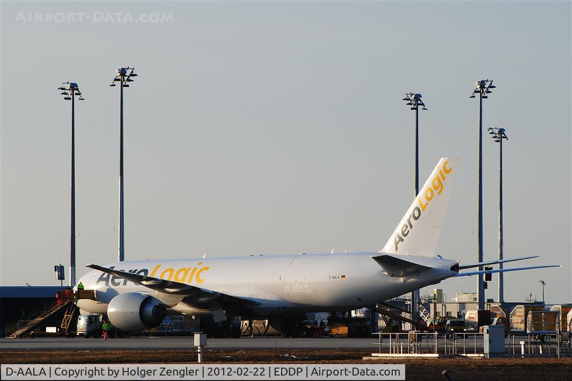 D-AALA, 2009 Boeing 777-FZN C/N 36001, Just arrived on home base - AeroLogic´s Alpha gets climbed by busy men.....