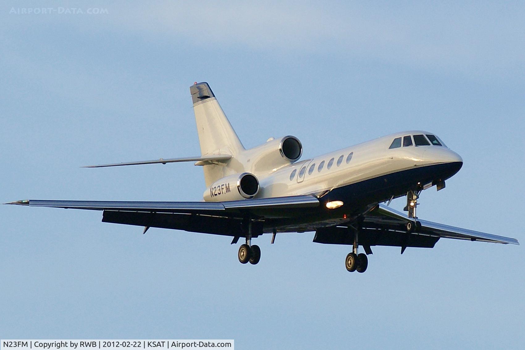 N23FM, 2000 Dassault Mystere Falcon 50 C/N 296, On approach 12R at sunset.