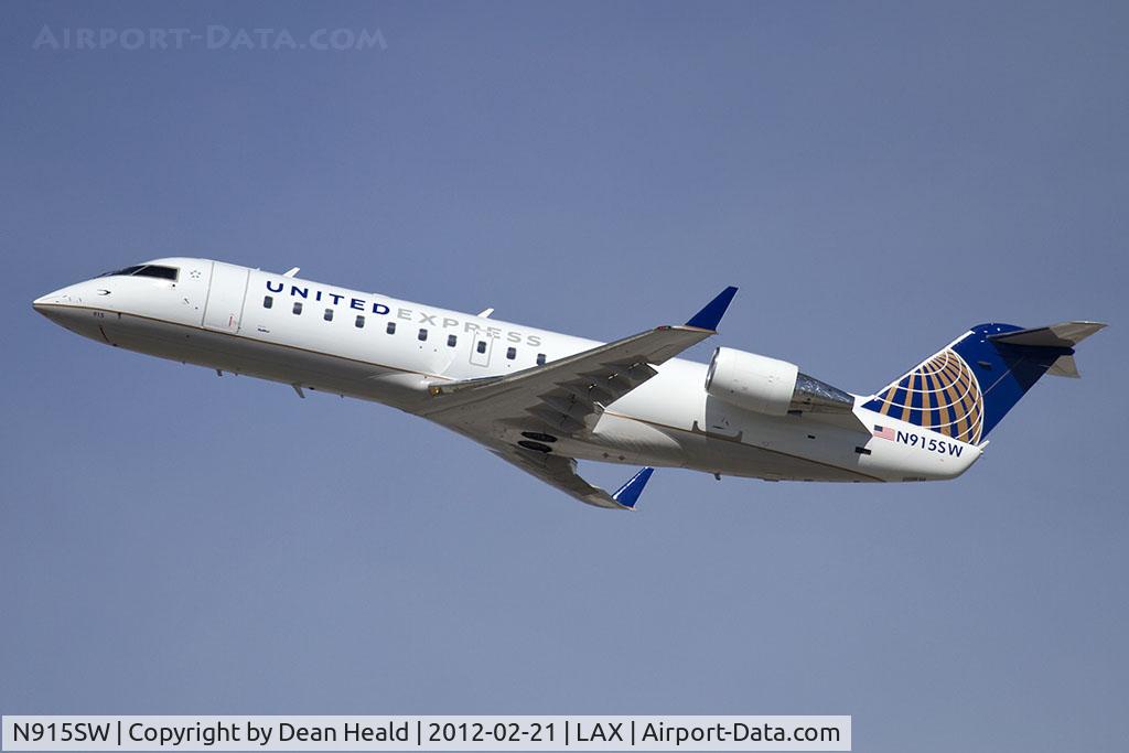 N915SW, 2002 Bombardier CRJ-200LR (CL-600-2B19) C/N 7615, United Express (SkyWest Airlines) N915SW (FLT SKW5459) climbing out from RWY 25R en route to Portland Int'l (KPDX).