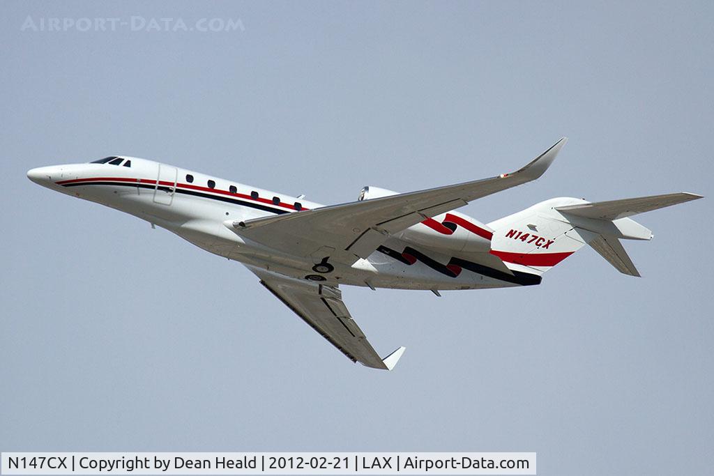 N147CX, 2001 Cessna 750 Citation X C/N 750-0147, Charlie Ten LLC 2001 Cessna 750 Citation X N147CX climbing out from RWY 25L.
