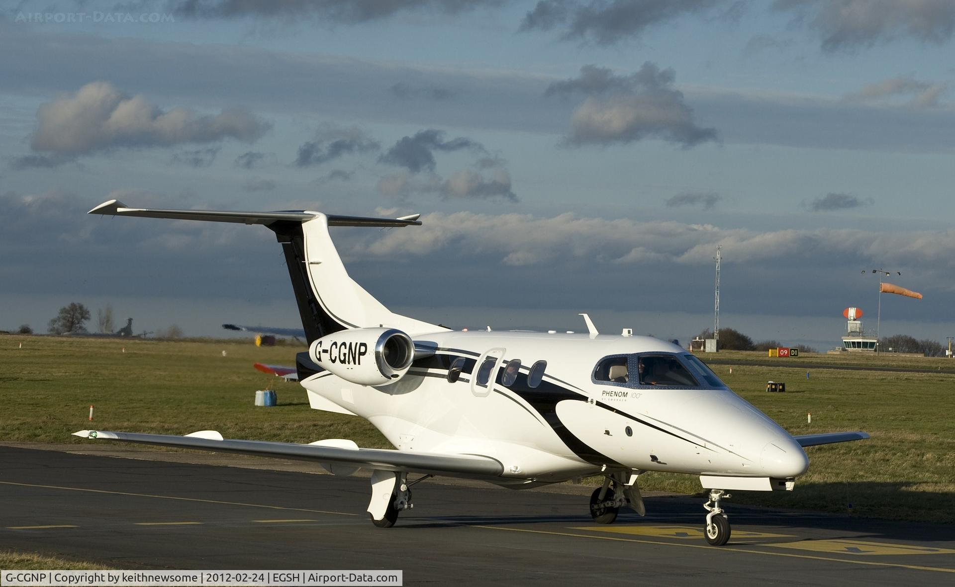 G-CGNP, 2010 Embraer EMB-500 Phenom 100 C/N 50000146, Taxying from runway to Saxonair.