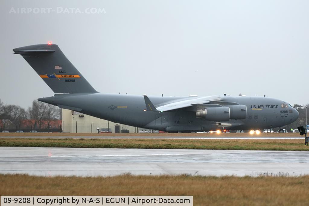 09-9208, 2009 Boeing C-17A Globemaster III C/N P-208, Departing a wet Mildenhall