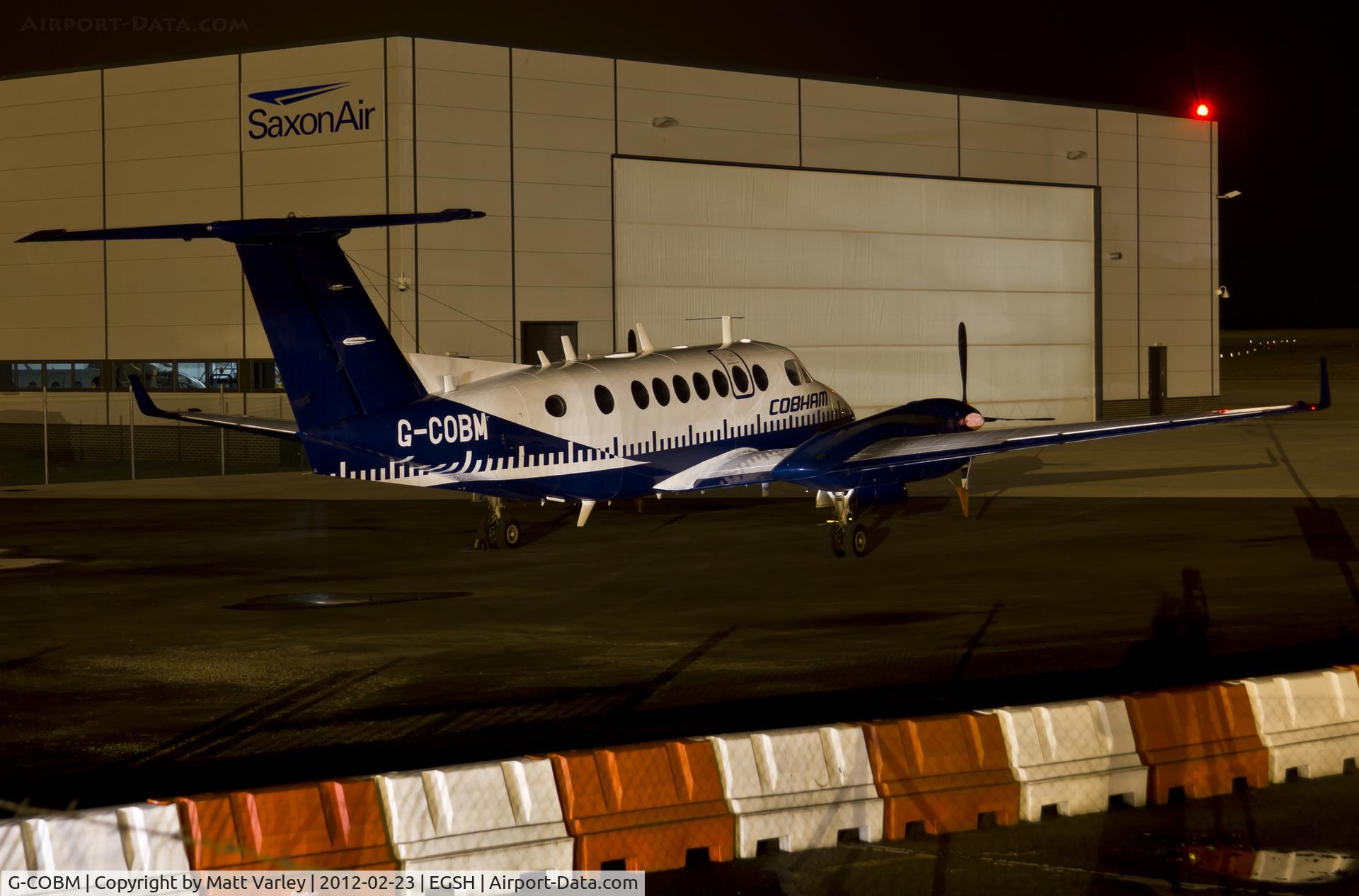 G-COBM, 1994 Beech Super King Air 350 C/N FL-124, Sat on stand at SaxonAir.