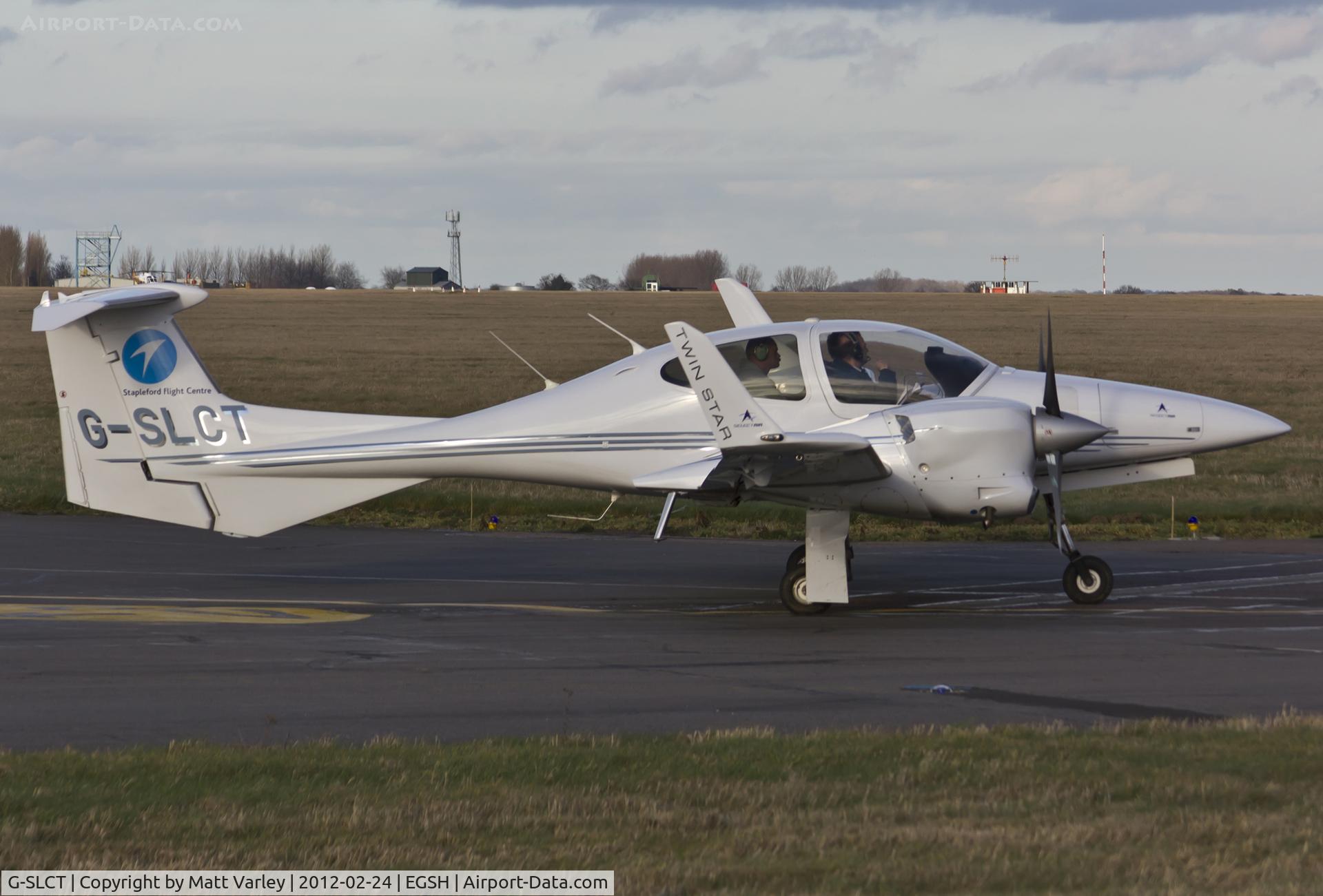 G-SLCT, 2005 Diamond DA-42 Twin Star C/N 42.031, Taxiing away from SaxonAir.