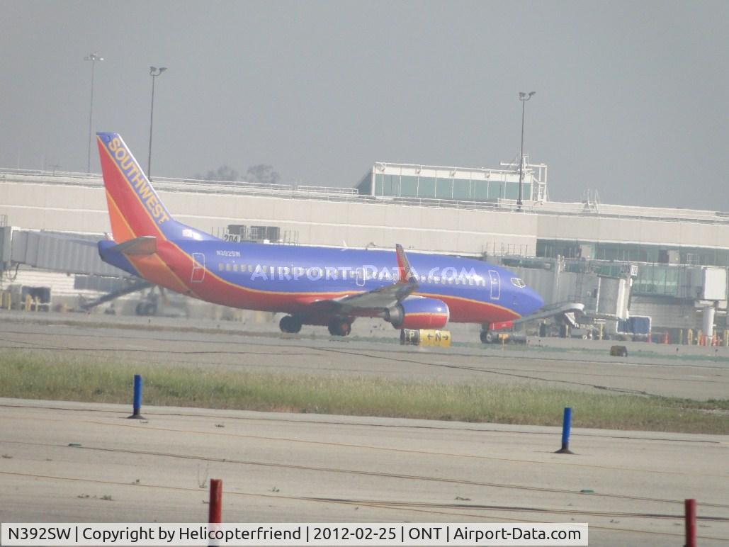 N392SW, 1994 Boeing 737-3H4 C/N 27379, Just landed on 26R and is taxing back to terminal