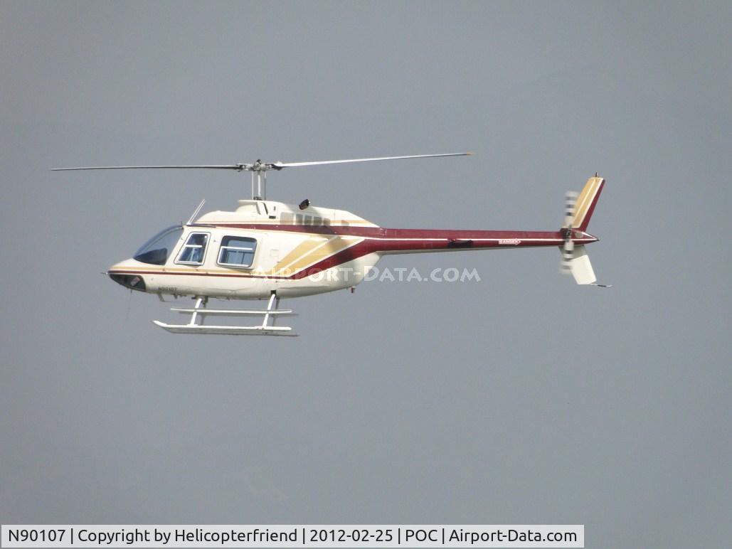 N90107, 1975 Bell 206B JetRanger C/N 1596, On final over runway 26R heading to the hangers on the northwest area