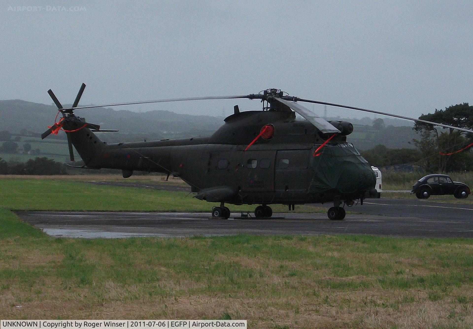 UNKNOWN, Helicopters Various C/N unknown, Grounded 33 Squadron RAF Puma HC.1. Had been operating on the adjacent RAF Pembrey Sands Air Weapons Range (EGOP).