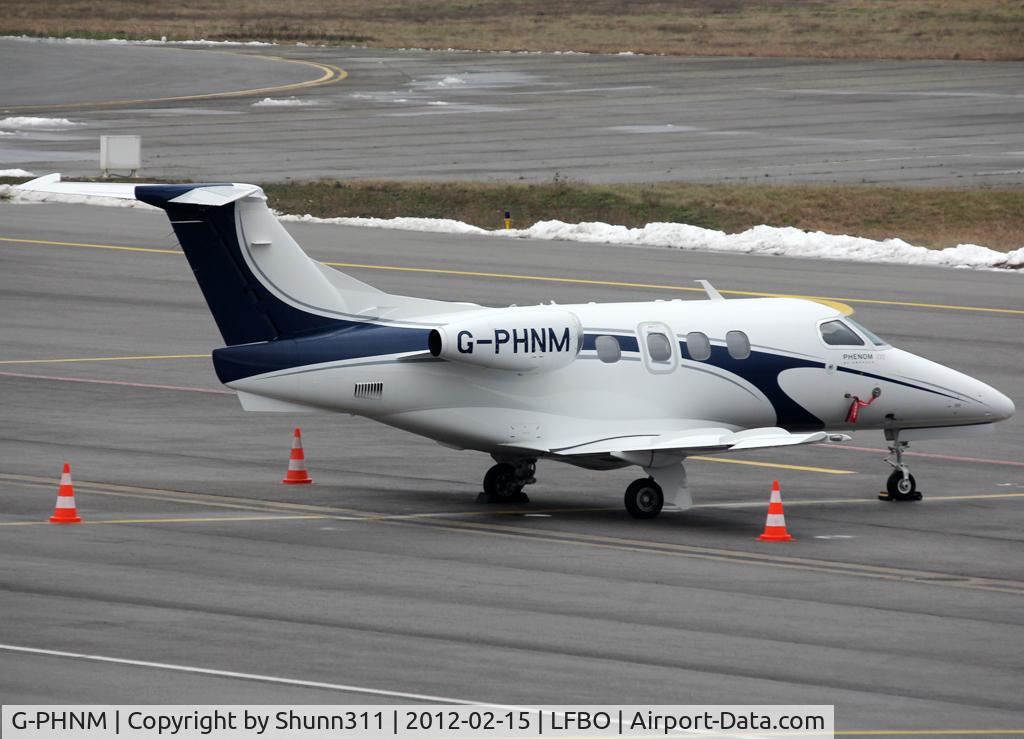 G-PHNM, 2010 Embraer EMB-500 Phenom 100 C/N 50000165, Parked at the General Aviation area...