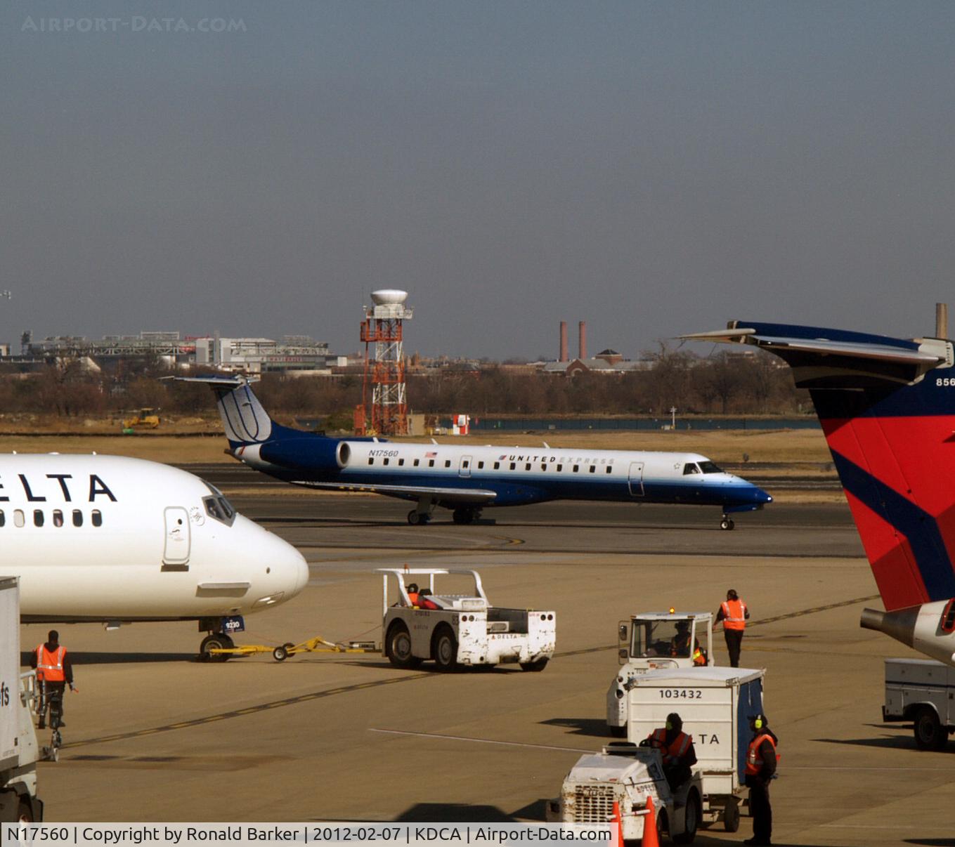 N17560, 2002 Embraer EMB-145LR C/N 145605, Taxi to parking DCA, VA