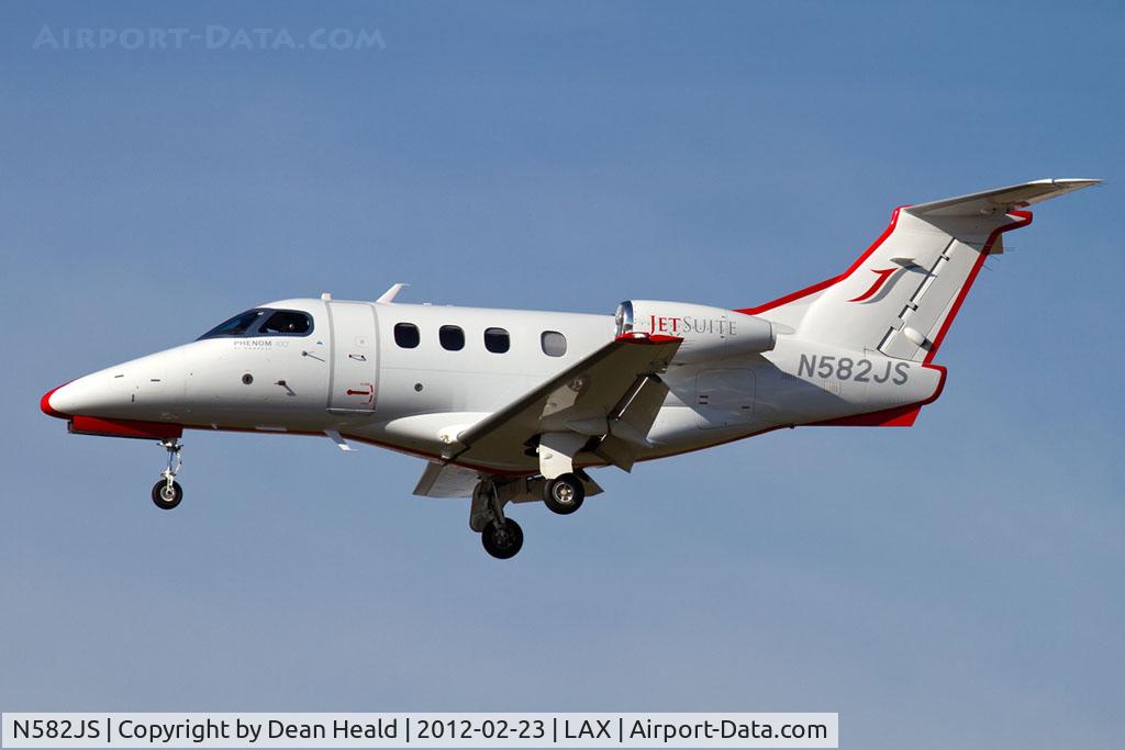 N582JS, 2010 Embraer EMB-500 Phenom 100 C/N 50000135, JetSuite Air 2010 Embraer 500 Phenom 100 N582JS (FLT RSP574) from Long Beach Daugherty Field (KLGB) on short final to RWY 25L.