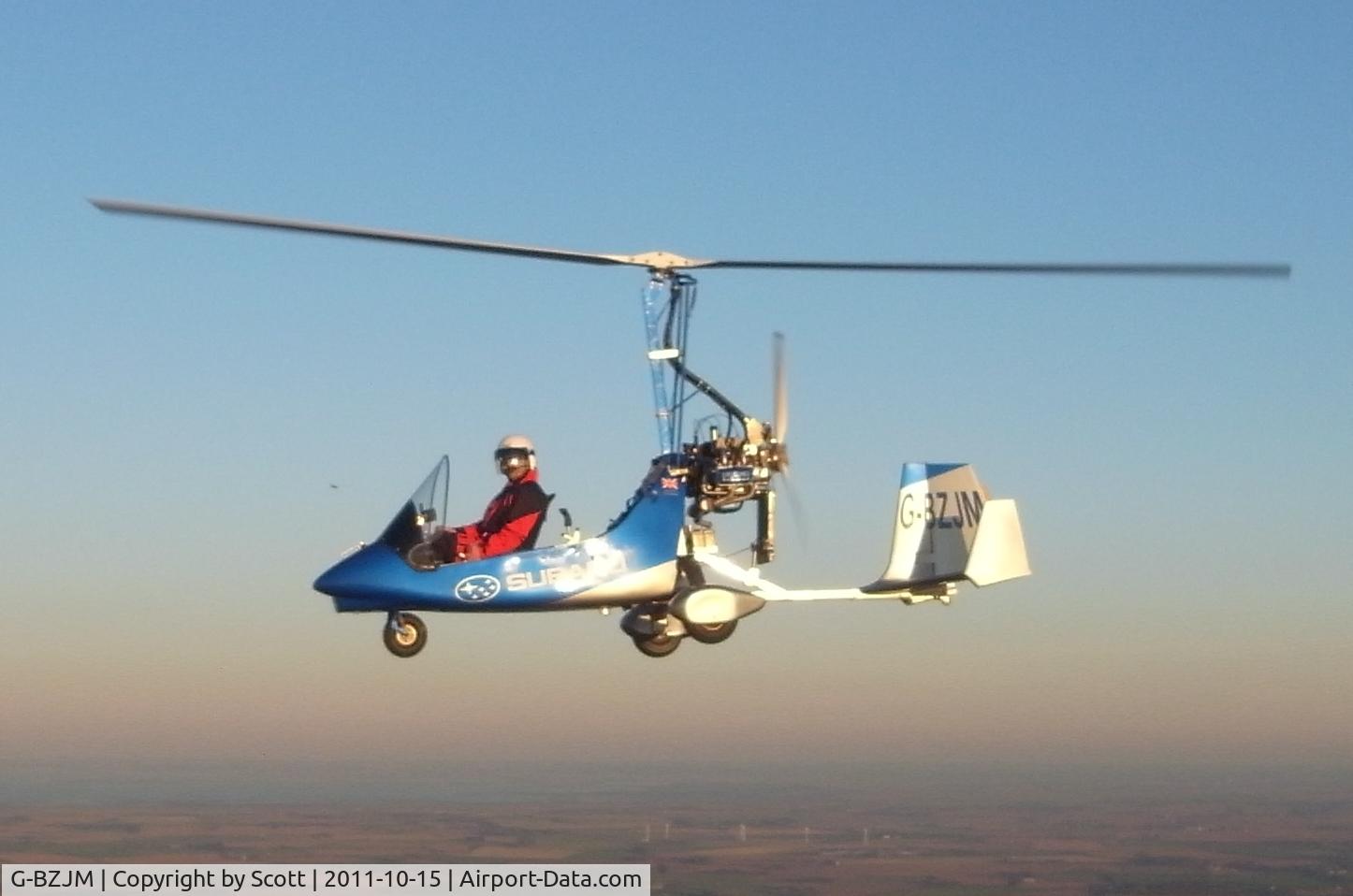 G-BZJM, 2006 VPM M-16 Tandem Trainer C/N PFA G/12-1301, VPM Gyro now fitted with a Subaru engine. Pilot Andy habgood flying over lincolnshire with holbeach town in the background.