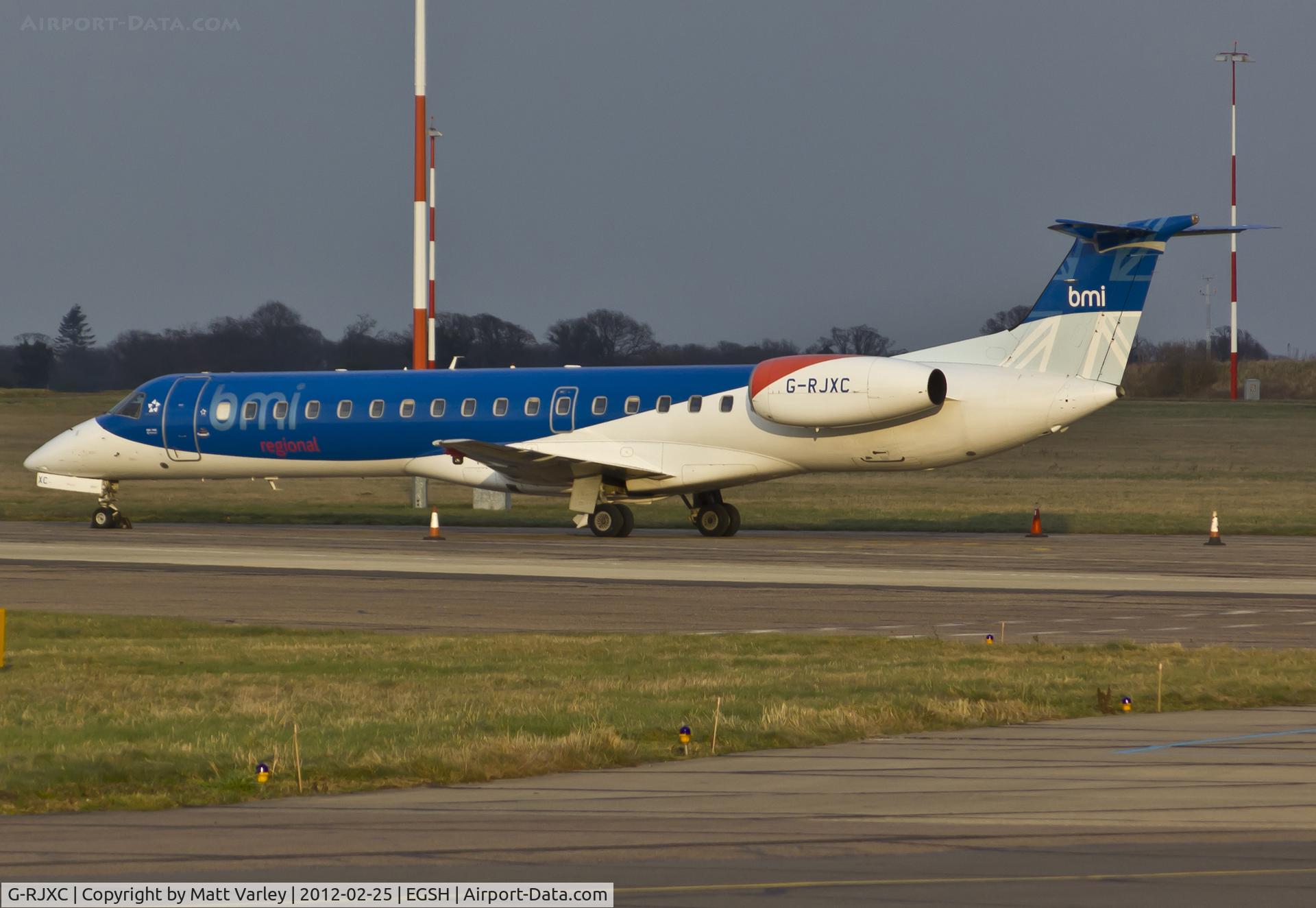 G-RJXC, 1999 Embraer EMB-145EP (ERJ-145EP) C/N 145153, Sat on stand 8 after arriving with the Man Utd team on board.