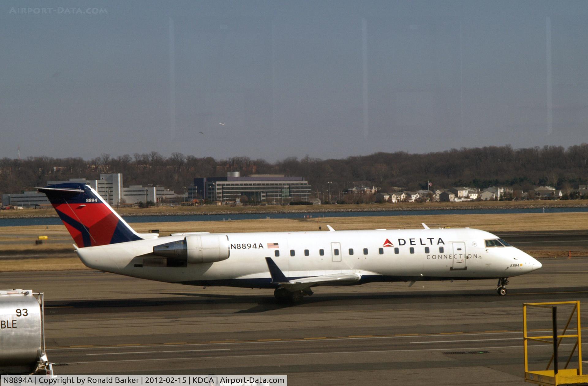 N8894A, 2003 Canadair CRJ-200LR (CL-600-2B19) C/N 7894, Taxi DCA
