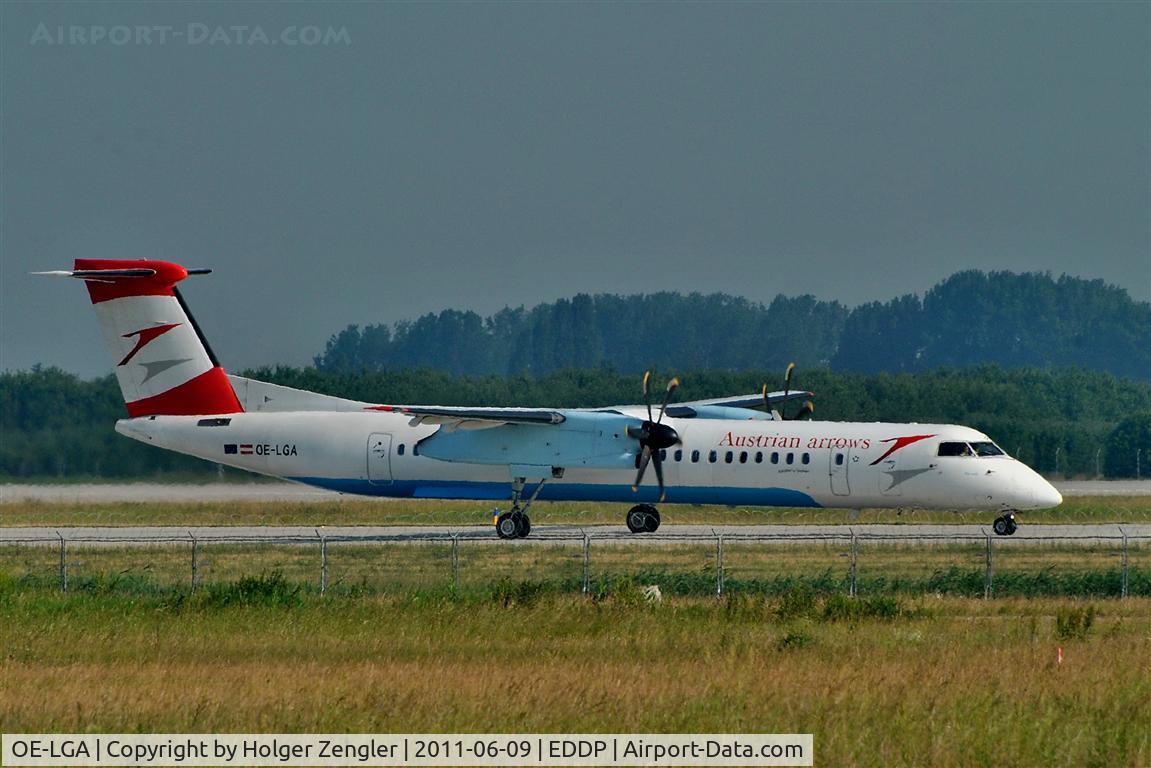 OE-LGA, 1999 De Havilland Canada DHC-8-402Q Dash 8 C/N 4014, On taxiway in morning light.....