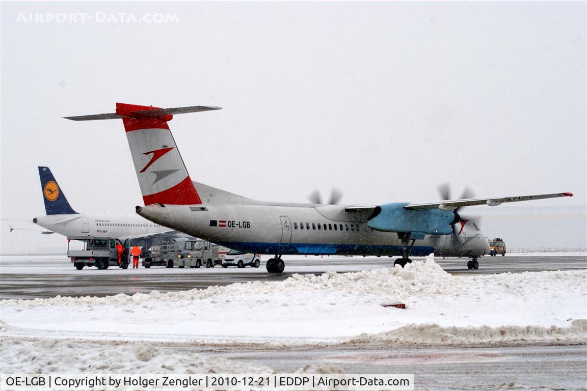 OE-LGB, 1999 De Havilland Canada DHC-8-402Q Dash 8 C/N 4015, Ready for a return to VIE in unfriedly weather....