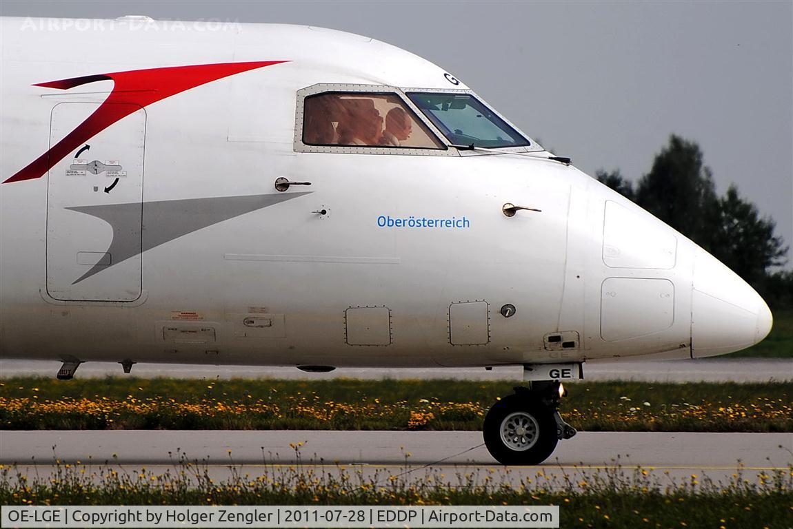 OE-LGE, 2001 De Havilland Canada DHC-8-402Q Dash 8 C/N 4042, Close shot of a rolling by personalized DASH 8 front unit.