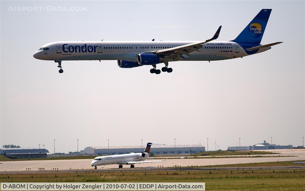 D-ABOM, 2000 Boeing 757-330 C/N 29022, On final approach in sight of a waiting Eurowings CRJ....