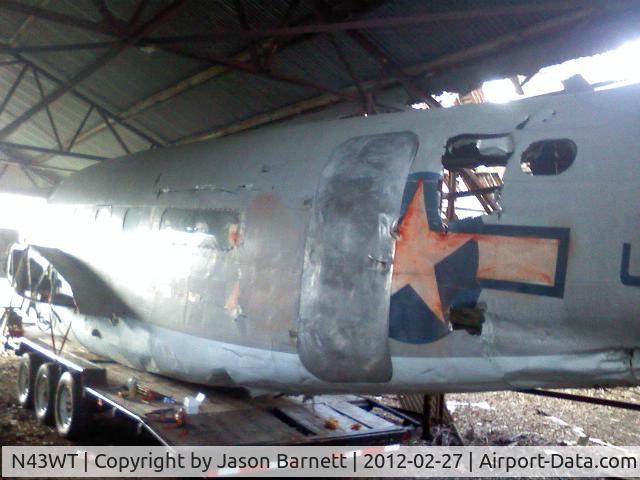 N43WT, 1943 Lockheed 18-56 Lodestar Lodestar C/N 18-2565, She isn't looking to good after being submerged in Hurricane Ike, being beat up in a junkyard and cut on by the Galveston TX Fire Department.
