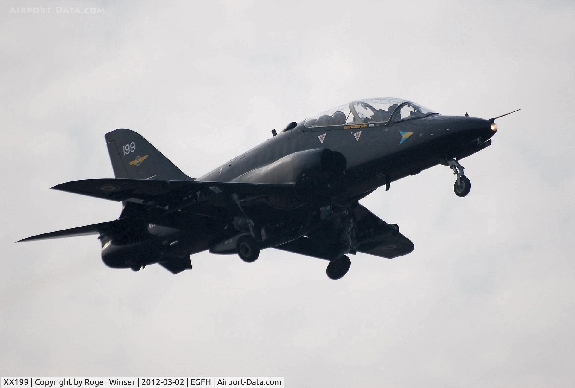 XX199, 1978 Hawker Siddeley Hawk T.1A C/N 046/312046, Coded 199 of 208 (Reserve) Squadron RAF. Seen climbing out after a practice approach to Runway 04.