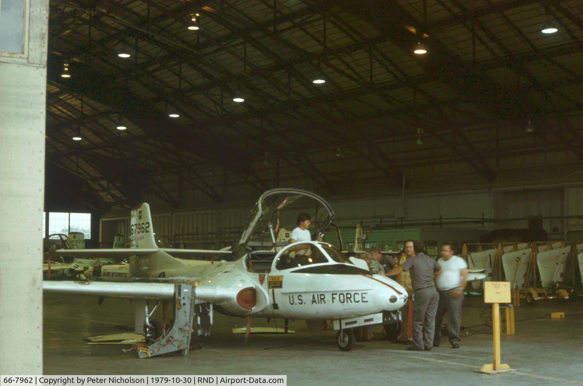 66-7962, 1966 Cessna T-37B Tweety Bird C/N 40922, Cessna T-37B undergoing maintenance at Randolph AFB in November 1979.