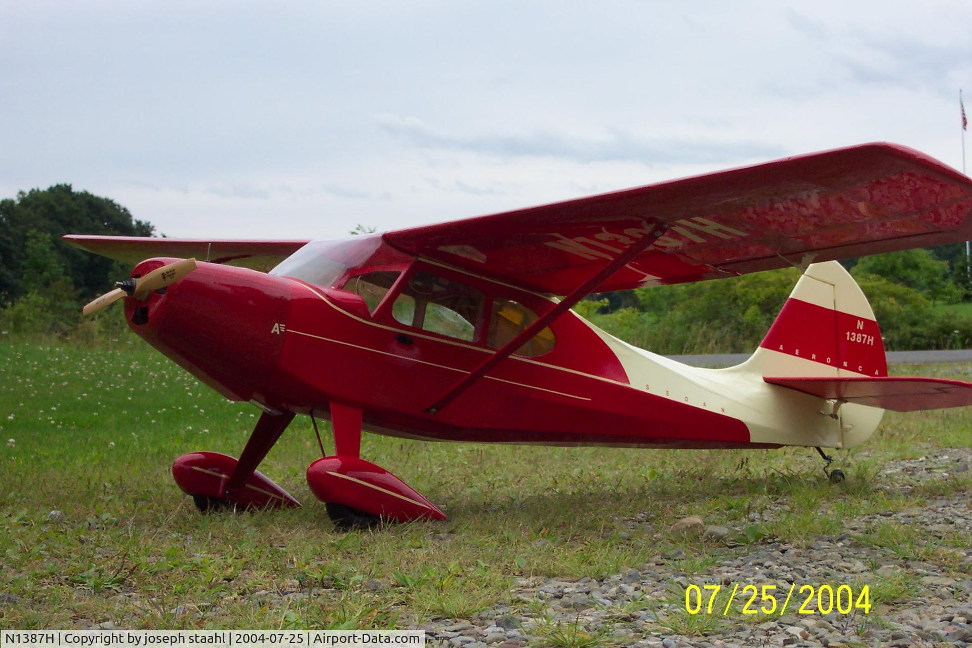 N1387H, 1949 Aeronca 15AC Sedan C/N 15AC-438, i made this 1/6 scale model from plans i drew using autocad from a berkley kit and aeronca plans from burl's aircraft in alaska.  i found photos  in an oshkosh article on the web, and built 1387!  it flies like an aeronca, stol and smooth. unfortunately i