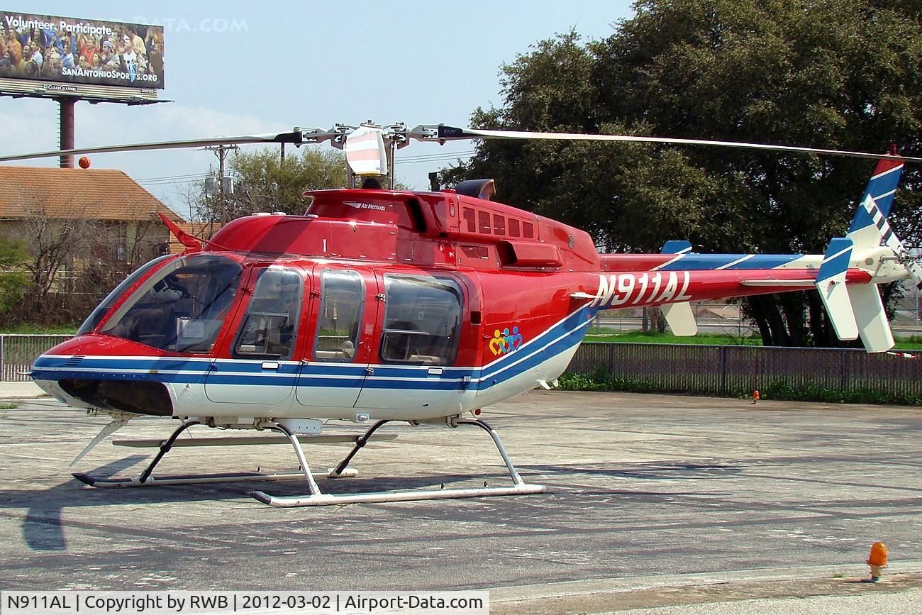 N911AL, 1997 Bell 407 C/N 53144, Parked at NE Baptist heliport, San Antonio, Texas, can not find the code for this heliport