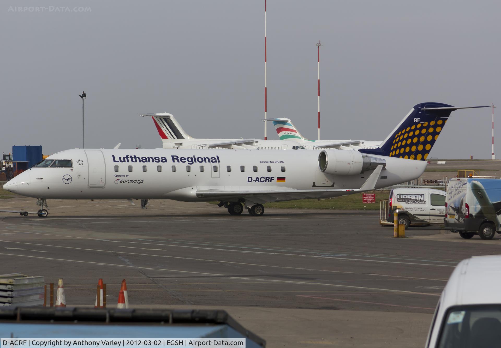 D-ACRF, 2002 Bombardier CRJ-200ER (CL-600-2B19) C/N 7619, Being pushed to the Air Livery hangar for spray into Yamal Airlines C/S.