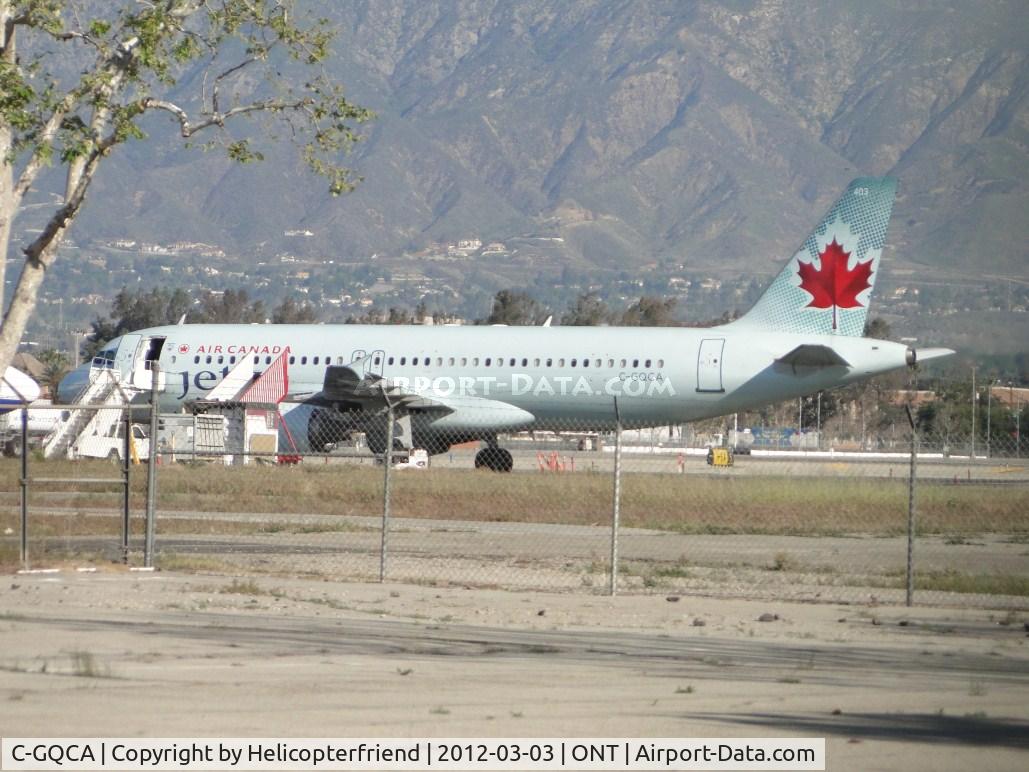 C-GQCA, 1991 Airbus A320-211 C/N 210, Parked at Atlantic Executive Terminal on the east side and accepting passengers and equipment