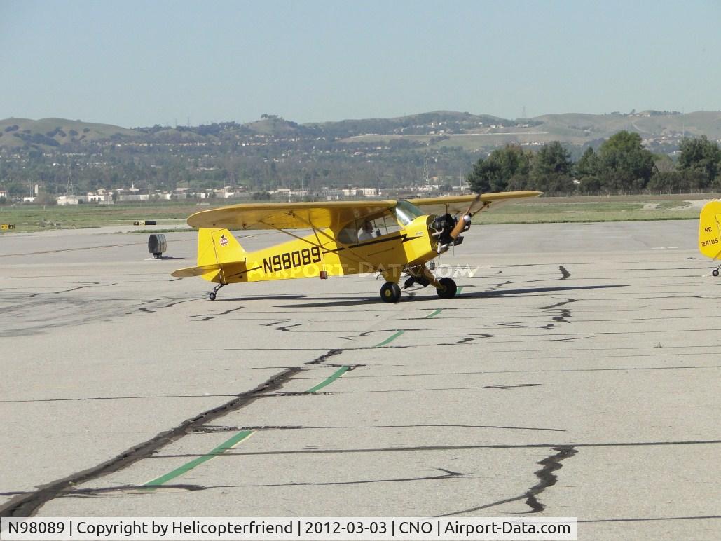 N98089, 1946 Piper J3C-65 Cub C/N 18259, Pulling into her display parking area