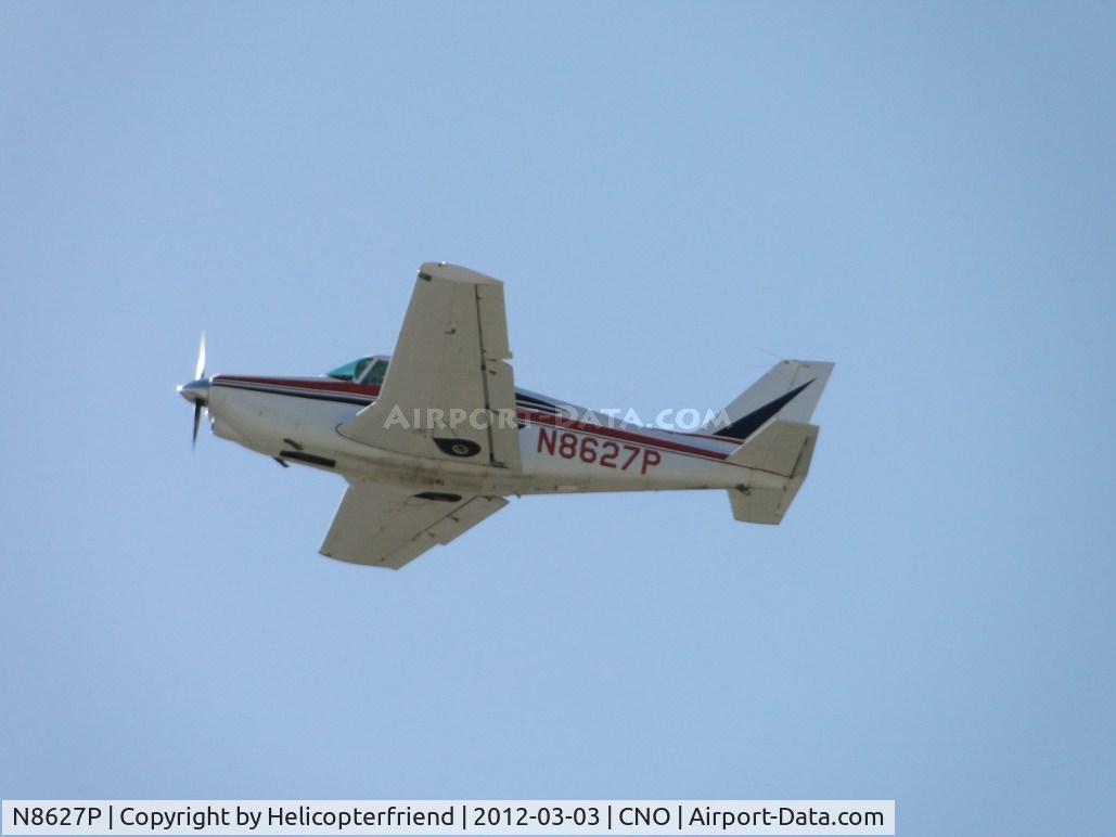 N8627P, 1964 Piper PA-24-260 C/N 24-4101, Landing gear retracted and headed eastbound