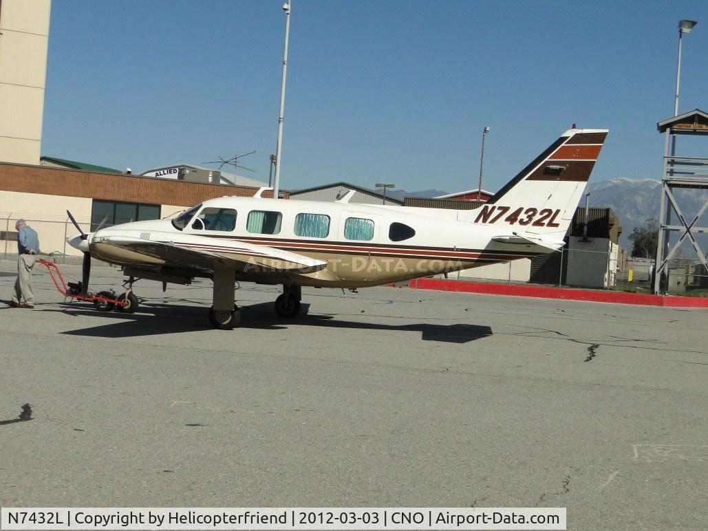 N7432L, 1972 Piper PA-31-310 Navajo C/N 31-820, Being towed towards the display area