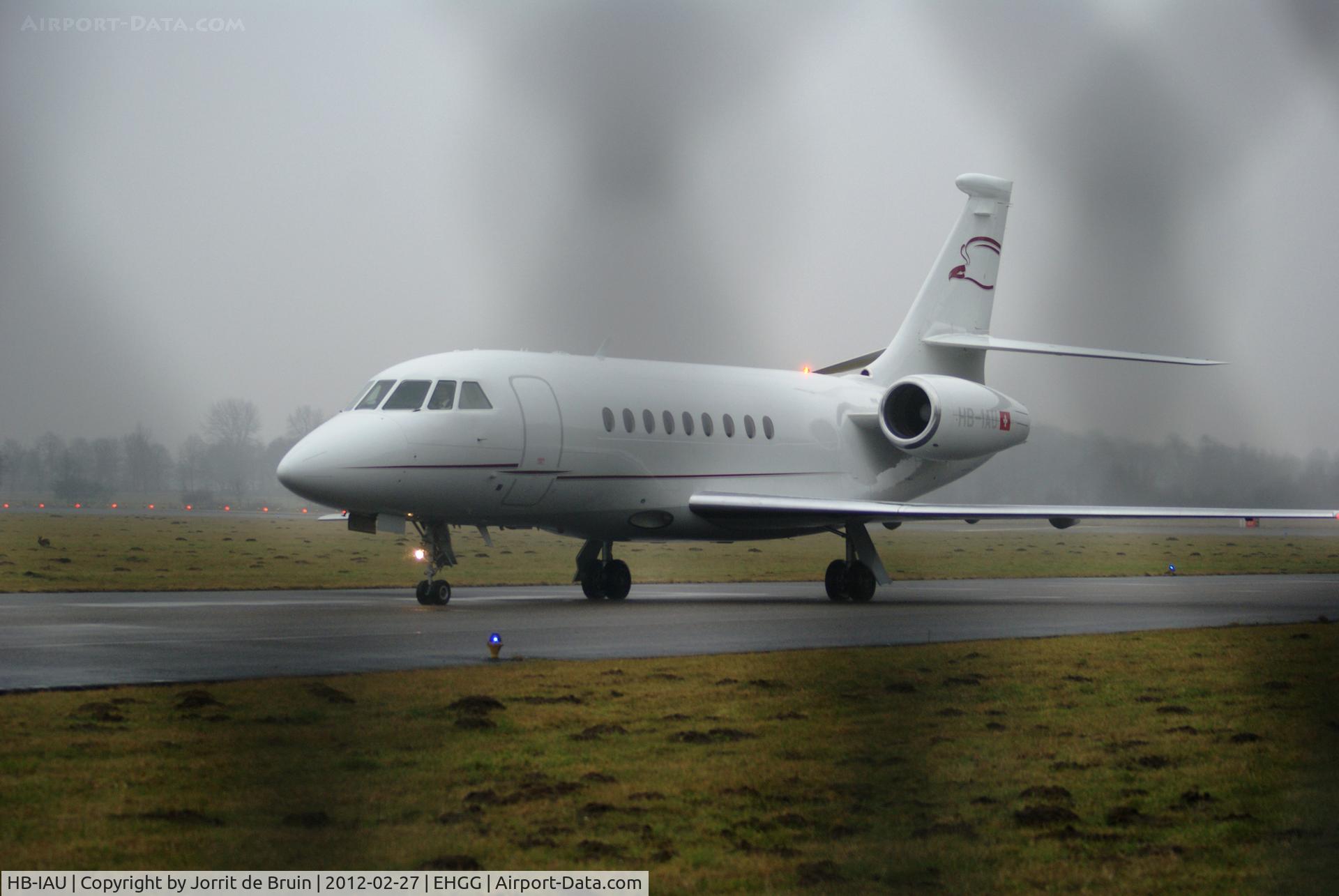 HB-IAU, 2003 Dassault Falcon 2000EX C/N 14, Taxing via taxiway Charlie to the apron after the landing on runway 23 from Munster.