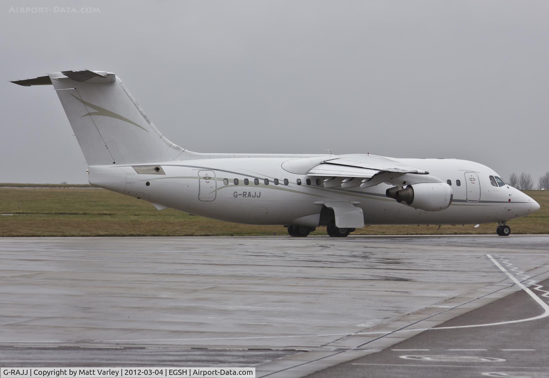 G-RAJJ, 1988 British Aerospace BAe.146-200 C/N E2108, Taxiing to RWY 27 at a very wet EGSH.