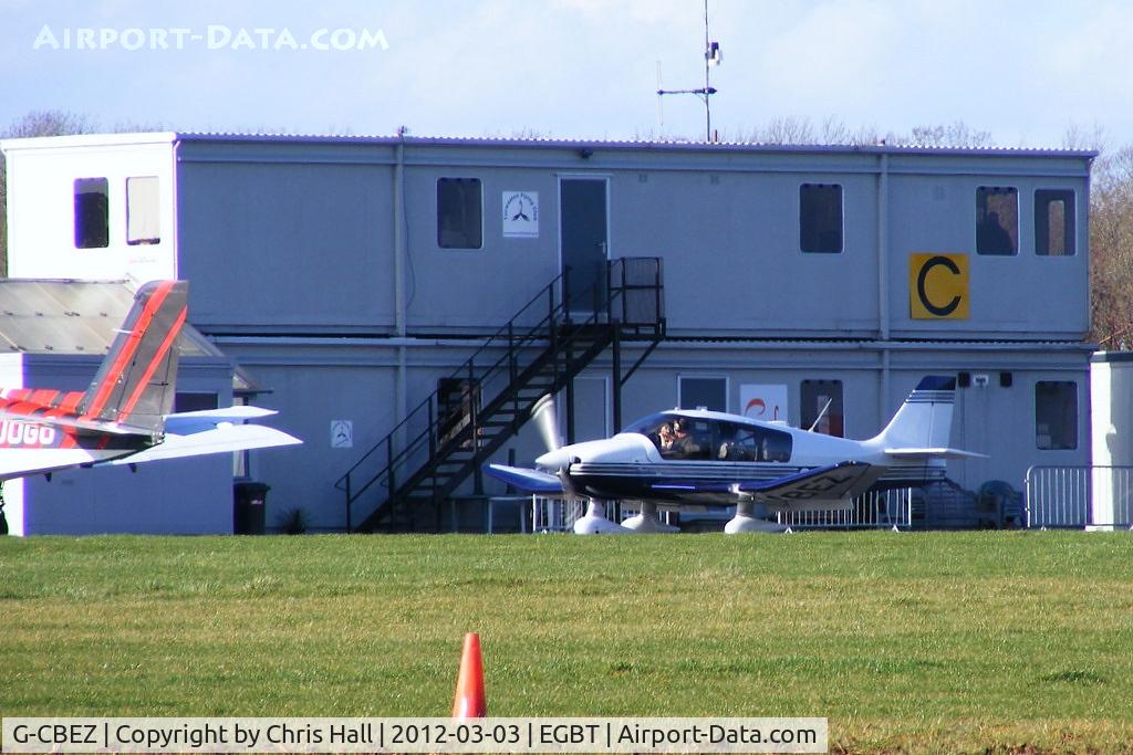 G-CBEZ, 2002 Robin DR-400-180 Regent Regent C/N 2511, resident Robin taxiing past the club house and cafe at Turweston