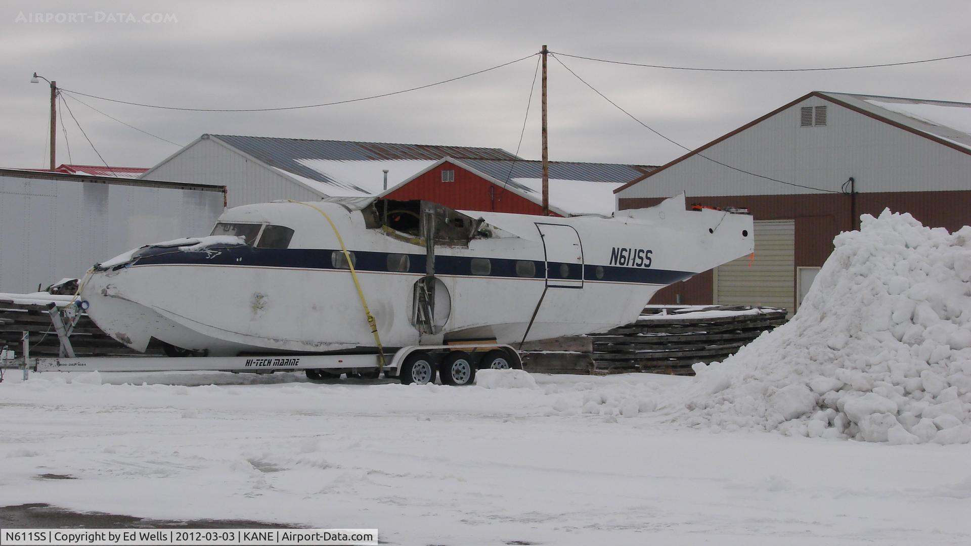 N611SS, 1946 Grumman G-73 Mallard C/N J-11, Parked behind a hangar @ KANE