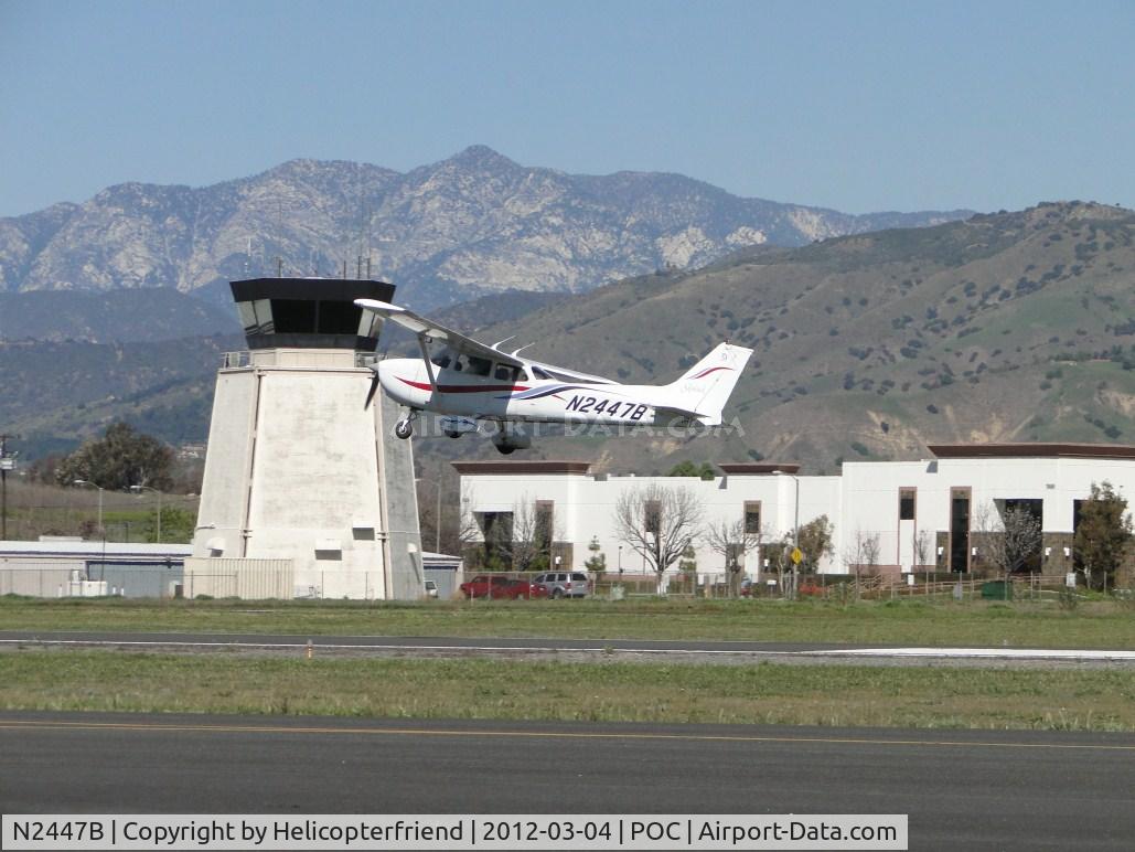 N2447B, 1999 Cessna 172R C/N 17280801, Climbing out westbound passing the Control Tower
