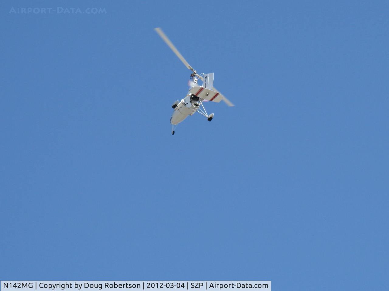N142MG, 1999 Givans Mark E Predator C/N 1, 1999 Givans PREDATOR powered autogyro, Lycoming IO-320-B1A 160 Hp pusher engine upgrade, takeoff climbout Rwy 04