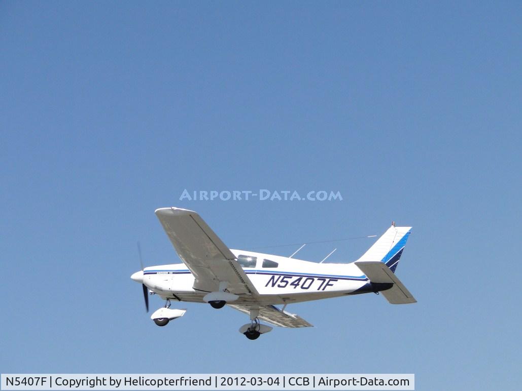 N5407F, 1977 Piper PA-28-181 Archer II C/N 28-7790112, Doing a fly by