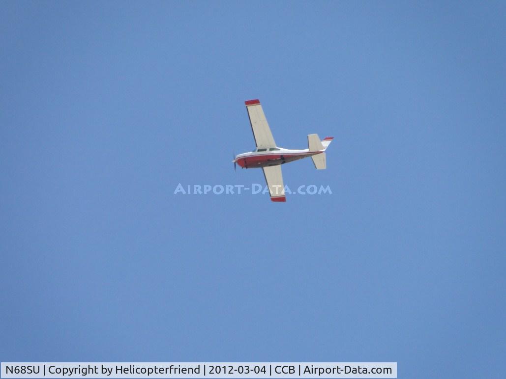 N68SU, 1977 Cessna 210 C/N 21061823, Northbound and heading for a ski area