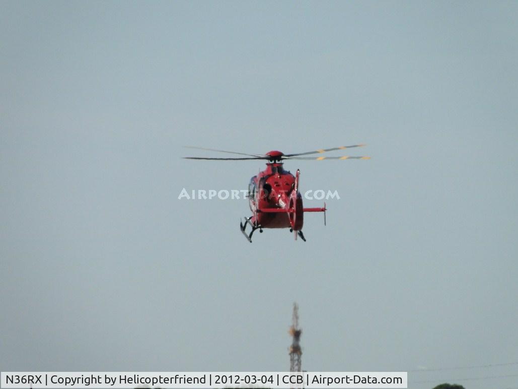 N36RX, Eurocopter EC-135P-2+ C/N 0859, Flaring to slow down for landing at their helipad on the westside