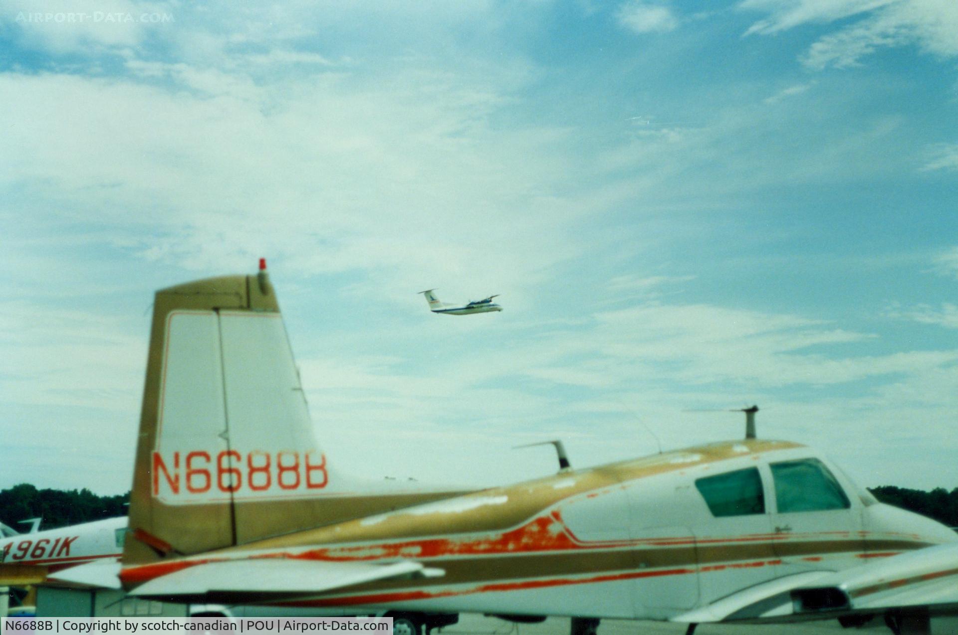 N6688B, 1958 Cessna 310C C/N 35788, 1958 Cessna 310C N6688B at Dutchess County Airport, Poughkeepsie, NY - circa 1980's 