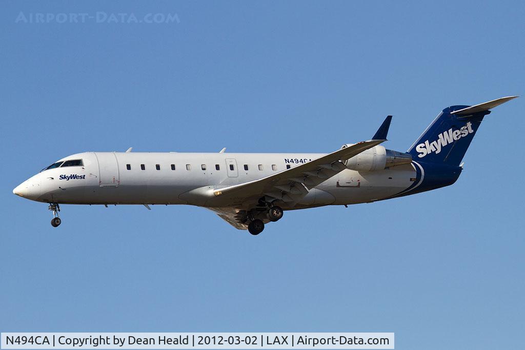 N494CA, 2003 Bombardier CRJ-200ER (CL-600-2B19) C/N 7765, SkyWest Airlines N494CA (FLT SKW6522) from Phoenix Sky Harbor Int'l (KPHX) on short final to RWY 25L.