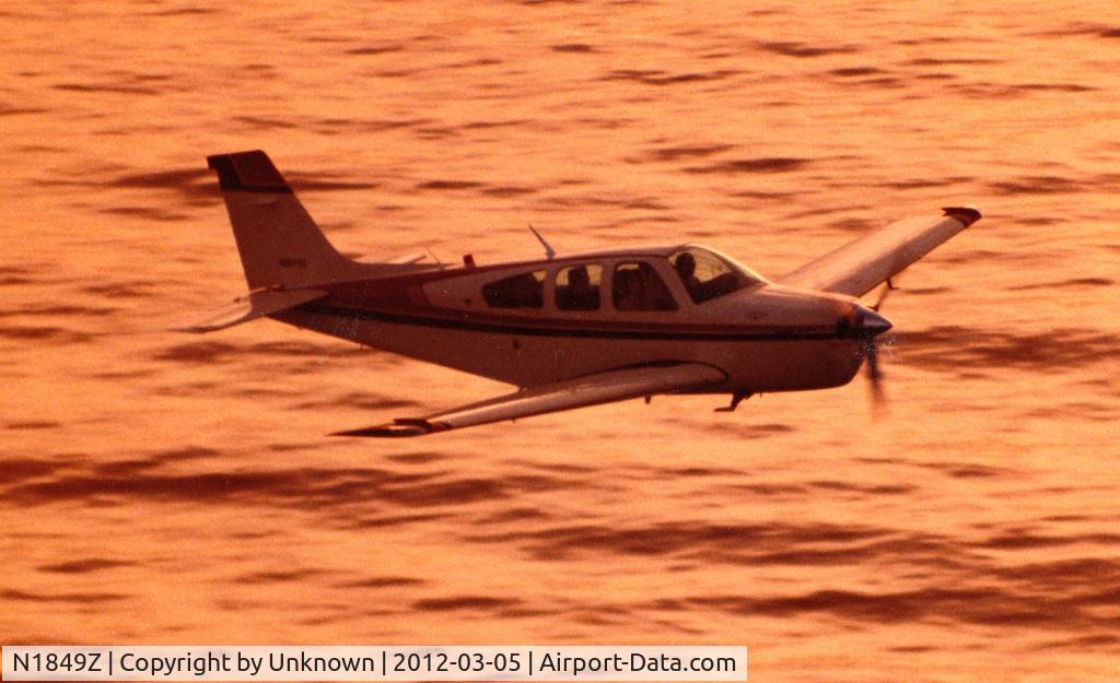 N1849Z, Beech F33A Bonanza C/N CE982, Over the Pacific at sunset-1984