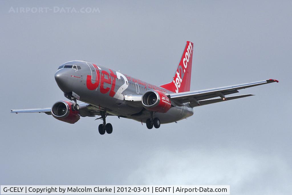 G-CELY, 1986 Boeing 737-377(QC) C/N 23662, Boeing 737-377 on approach to Runway 25 at Newcastle Airport, March 2012.