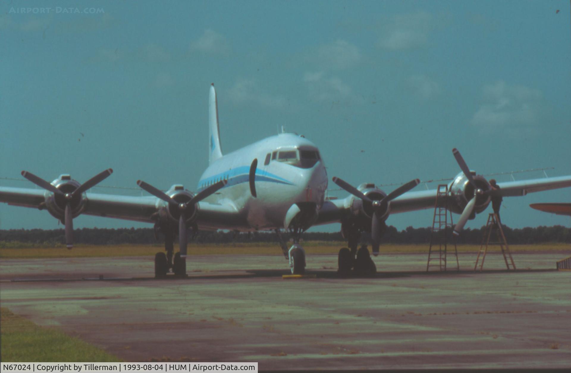 N67024, 1946 Douglas C-54D C/N 10550, C-54 N67024 of Environmental Aviation Services inc, in 1993 on the ramp of Houma-Terrebonne airport (HUM).